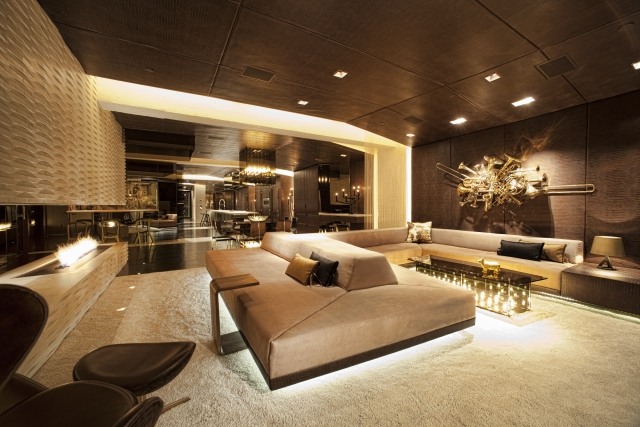 moderne-wohnzimmereinrichtung-ideen-braun-unterbeleuchtung-effekte-sofa-couchtisch