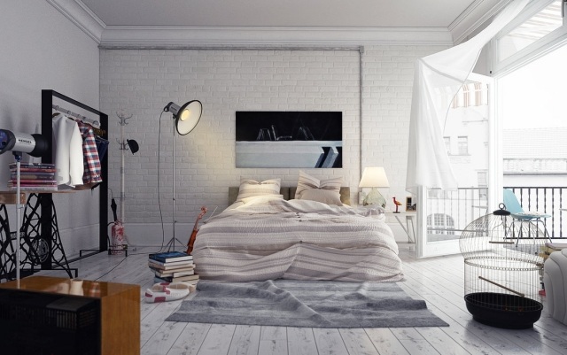 schlafzimmer-loft-stil-weisse-backsteinwand-kleiderstaender-weißer-dielenboden
