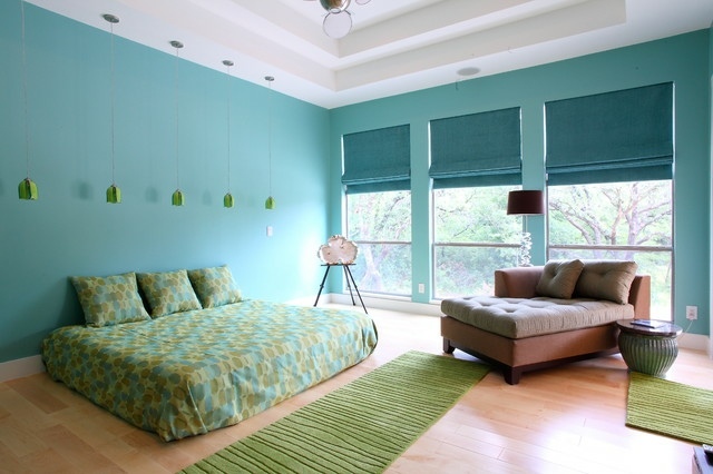 Wand türkis modern einrichten Teppich grün Tagesbett