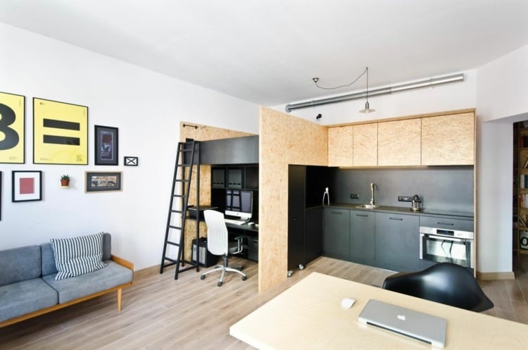 System aus Bett, Büro mit Schreibtisch und moderner Küche in einem