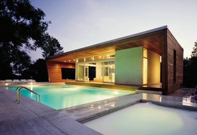 Terrassenbelag-aus-Beton-pflegeleicht-swimming-pool-outdoor-modern-atmosphäre-zum-loungen-beleuchtung