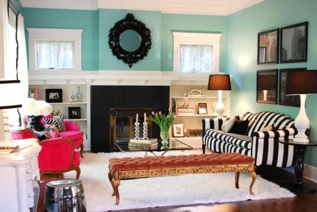eklektisches Wohnzimmer Ideen rosa Sessel Sofa schwarz weiß Polsterung