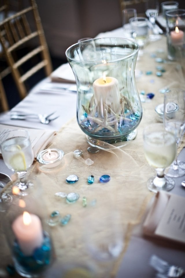 Tischdeko für Hochzeit ideen-meer-thema-windlicht-seesterne-dekosteine