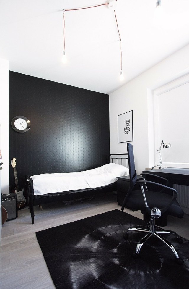 Schlafzimmer Wand schwarze Farbe Teppich Blumenmuster