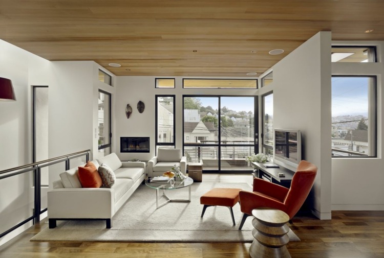 wohnzimmer modern einrichten weiss couch orange moebel akzente