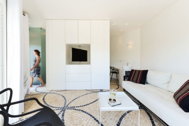 Wohnen-puristisch-suite-schlafzimmer-sitzbereich-drehbar-fernseher