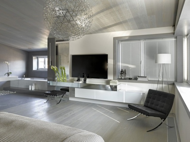 ei-suite-luxus-schlafzimmer-marmor-waschtisch-Led-Fernseher-relaxstuhl-leder