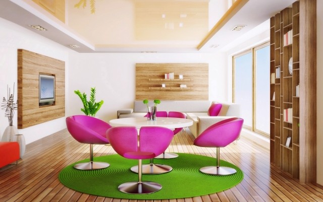 modernes-wohnzimmer-grüner-teppich-rund-holz-fußboden-lila-drehbare-sessel
