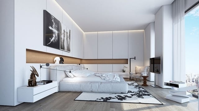 schlafzimmer-modern-indirekte-beleuchtung-decke-weisse-wandpaneele-polsterbett