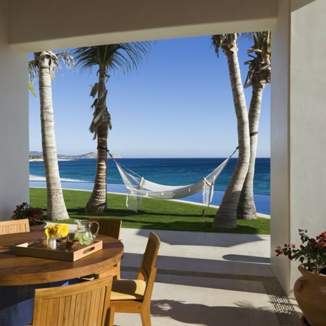 strand haus-terrasse-hängematte esstisch palmen