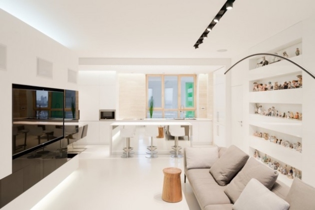 wohnzimmer-einbauregale-kücheninsel-weiß-innendesign-schlicht