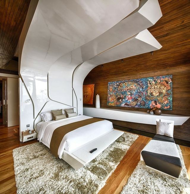 Schlafzimmer-Wandgestaltung-Holz-Paneele-übergroßer-Bett-Kopfteil