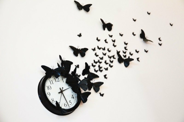 Wanddeko mit Uhr schwarze Schmetterlinge coole Ideen 