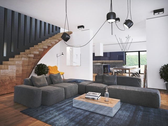 Wohnzimmer-schwungvolle-treppe-holz-fußboden-Sofagarnitur-Grau-Pendellampen