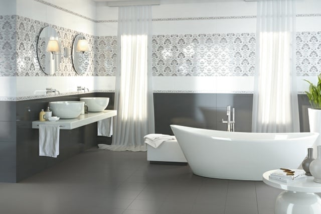 eine-Badewanne-Badezimmer-im-Grau-mit-Anthrazit-Fiesen-und-Figuren