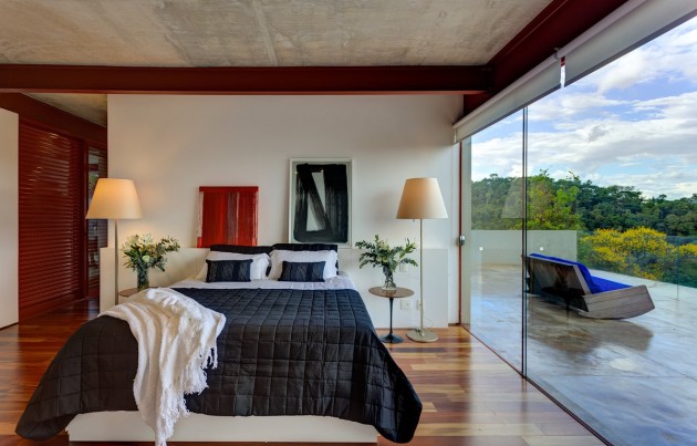modernes-schlafzimmer-grosser-fensterfront-terrasse-beton-decke