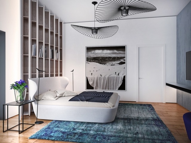 schlafzimmer-design-bett-kopfteil-geschwungen-wand-gemälde-surrealistische-skipiste