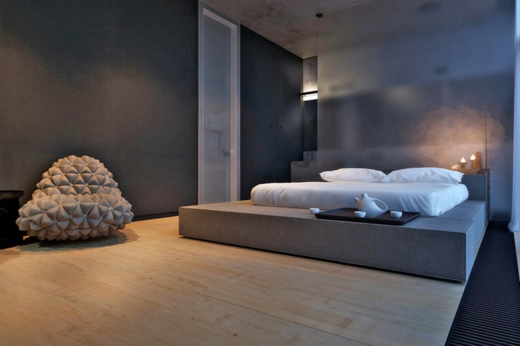 Schlafzimmer minimalistisch einrichten Sitzsack 3D Beton Oberfläche
