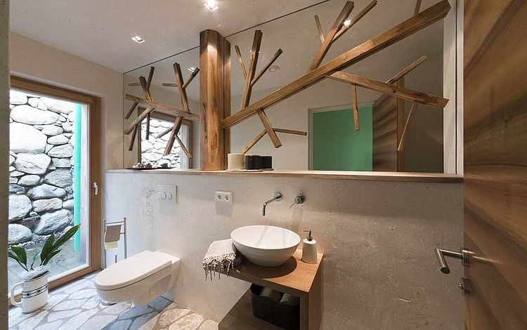 badezimmer-rustikal-sichtbeton-stein-holz-elemente