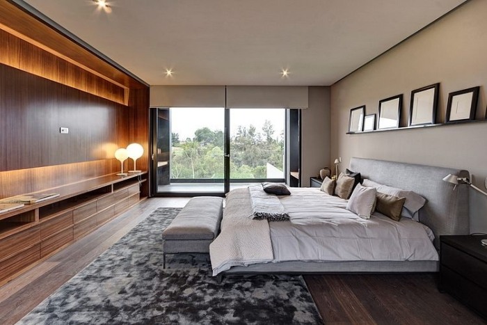 moderne-schlafzimmer-gestaltung-fensterschutz-faltrollos-beleuchtung-wohnwand