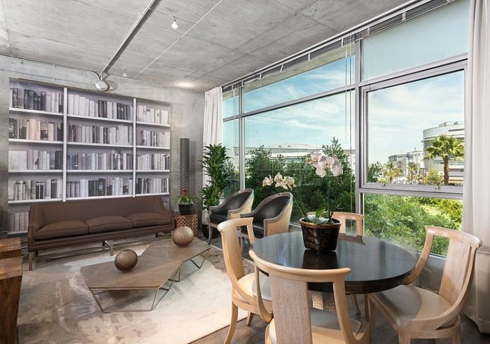 raffinierte-loft-wohnung-betondecke-wohnzimmer-sitzbereich-3d-visualisierung
