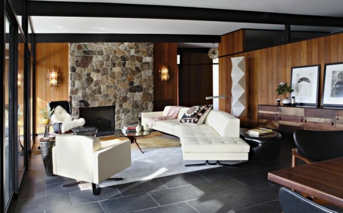 rundes-weißes-Sofa-Wanddekor-mit-Steinen-Großformat