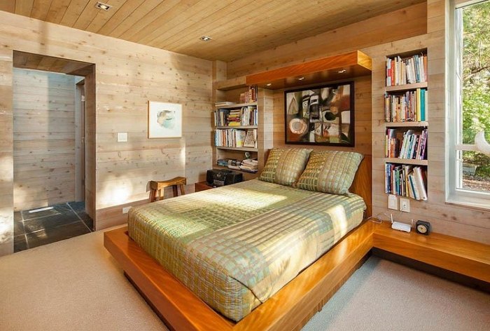 schlafbereich-Vollholz-Doppelbett-einrichtung-gemütlich-Regalsystem-Holz-offen-eingebaut