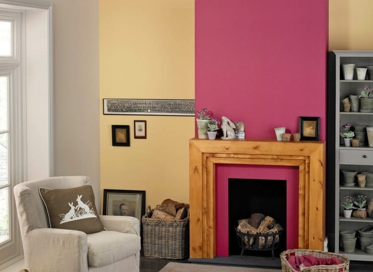 Wandfarbe Ideen gelb rosa Wohnzimmer Kaminsims