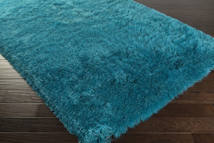 hochflor-teppich-modern-türkis-blau-handgetuftet-Kuschelweiche-Textur