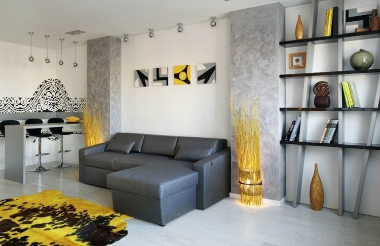 Wohnzimmerwände Ideen -streichen-graue-effektfarbe-gelbe-akzente