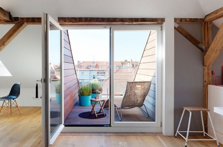 Design-Apartments-Dachgeschoss-Dachterrasse-Südlage-Stadtblick-terrassenstuhl