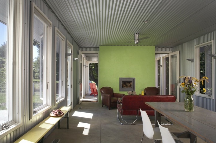 Grün Wohnzimmer Wand lila Hocker Polstermöbel