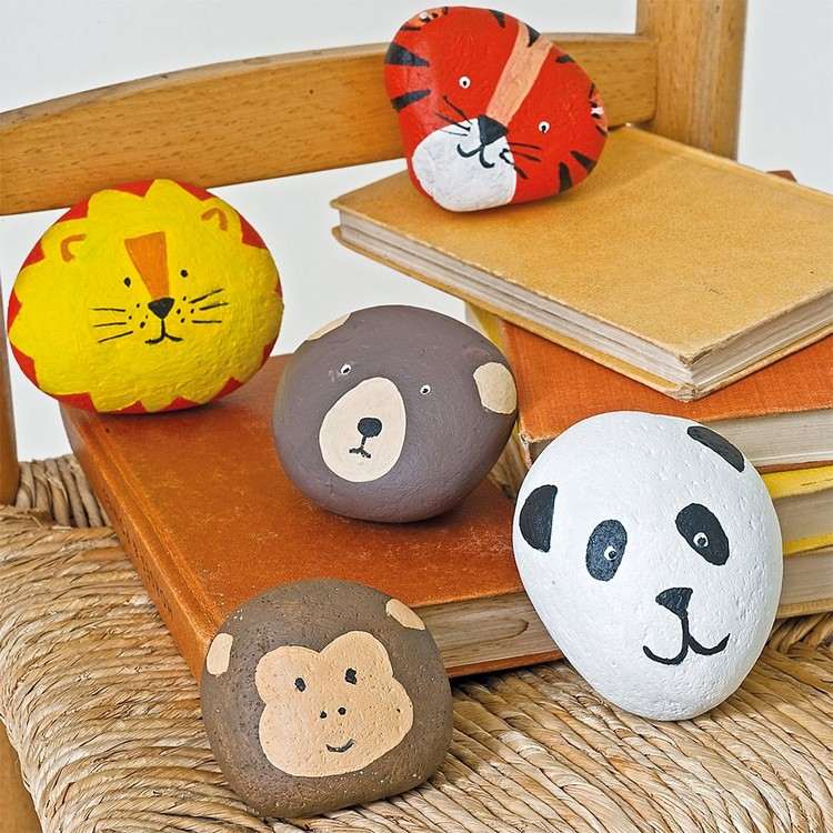 Tiere auf Steine malen Panda und Bär und Löwe und Affe