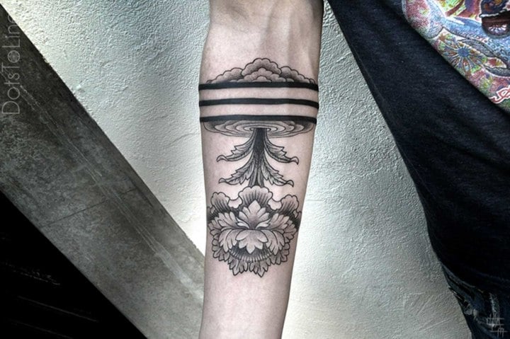 Unterarm-Tattoo-Ideen-Maori-Motive-Baum-Himmel