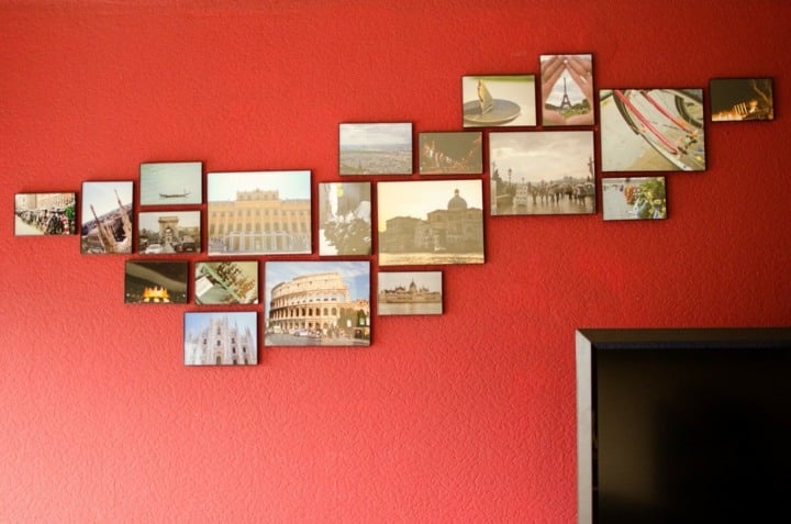 Bilderrahmen-Collage-rote-Wand-Akzentfarbe-Wohnzimmer