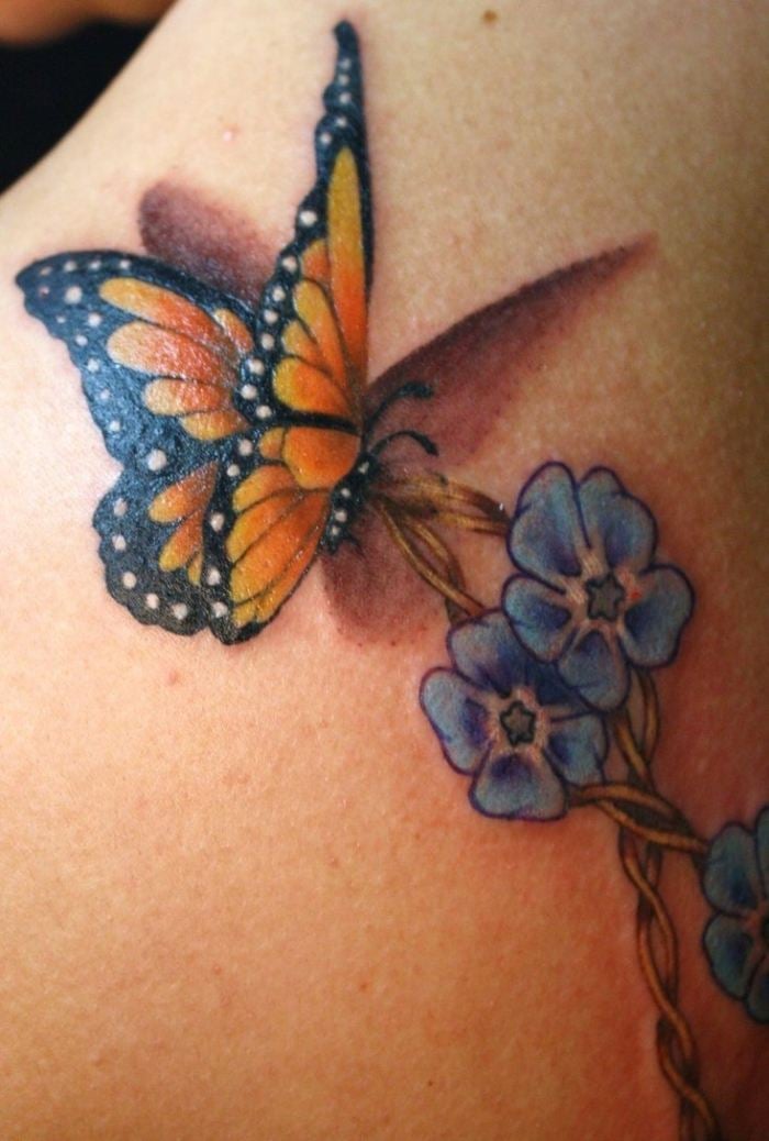 Schmetterling-Tattoo-mit-Blume-Bunt-Schatten-Ideen-Frauen-tattoos