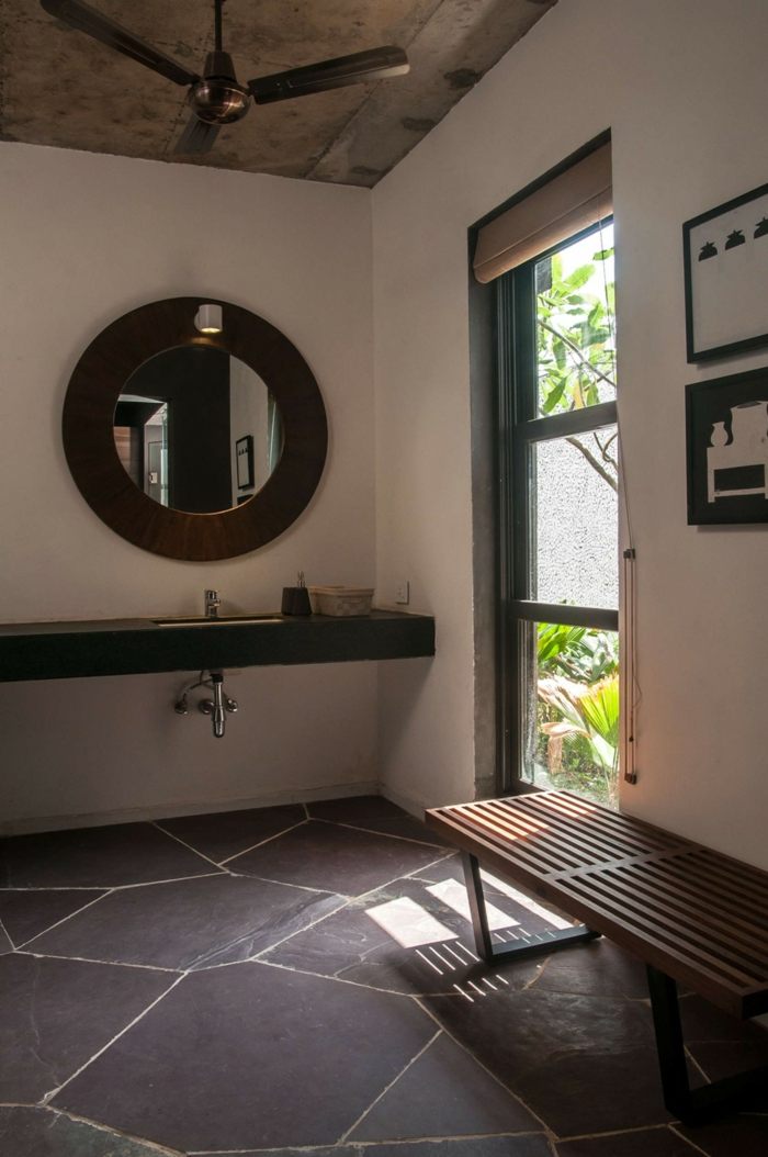badezimmer design villa steinfliesen konsole modern bank holz