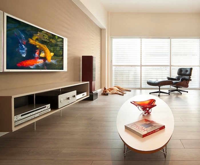 design-Fernsehsessel-im-Wohnzimmer-eames-relaxsessel-mit-hocker