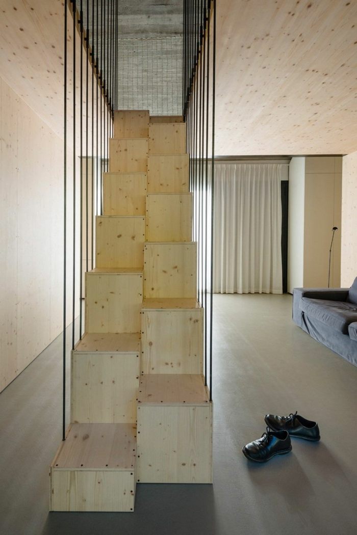 moderne treppe stufen holz geländer effektvoll schuhe wohnzimmer
