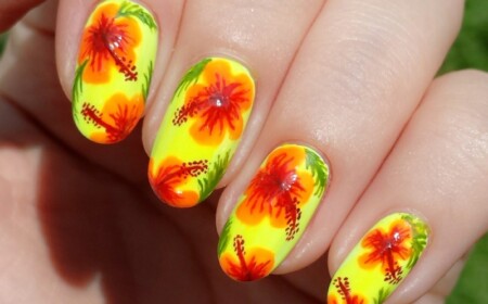 nageldesign ideen exotisch blumen hibiskus gelb orange sommer look