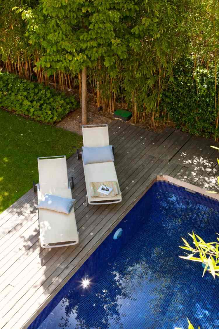 terrasse-gestalten-2015-holz-terrassendielen-pool-sonnenliegen