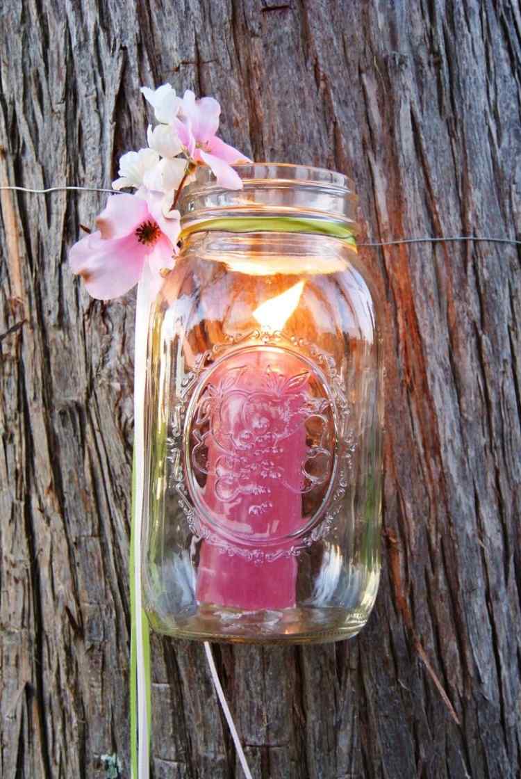 Windlichter Garten -glas-rosa-stumpenkerze-blumen