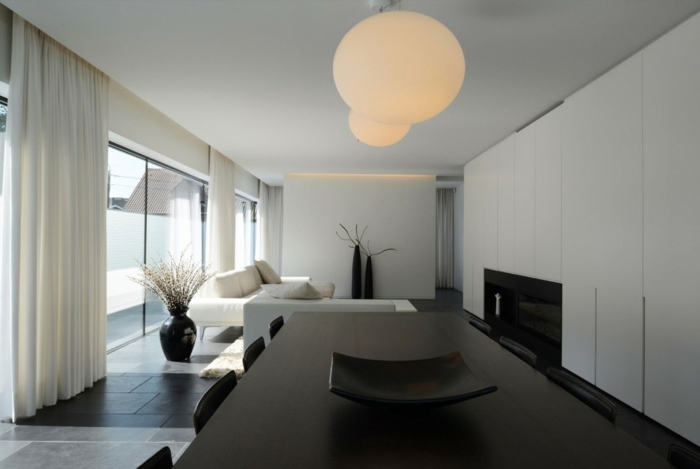 wohnzimmer design esstisch schwarz sofa weiß kamin