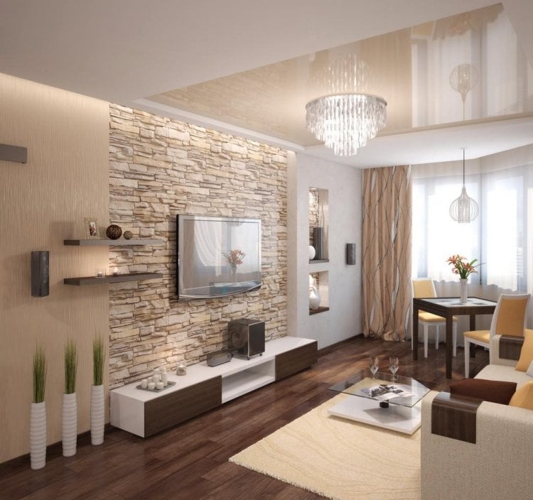 Wohnzimmer modern -einrichten-beige-warm-natursteinwand-wand-montierter-fernseher
