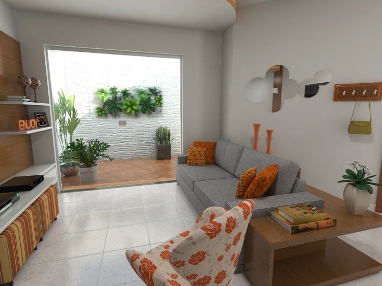wohnzimmer-modern-einrichten-graues-sofa-orange-akzente