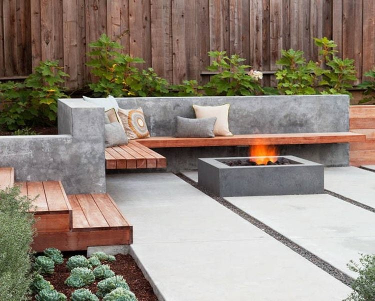 beton design sitzbereich bank feuerstelle dekokissen pflanzen sukkulenten