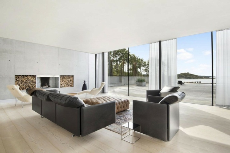 haus design wohnzimmer kamin moderne einrichtung meer fensterfront