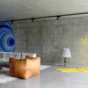 modern wohnzimmer design wand beton look sofa sessel teppich