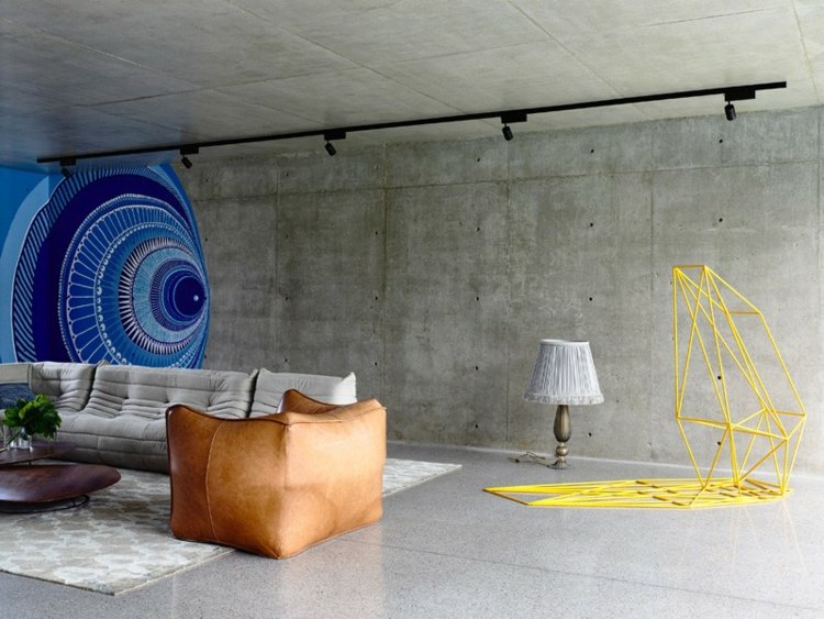 modern wohnzimmer design wand beton look sofa sessel teppich