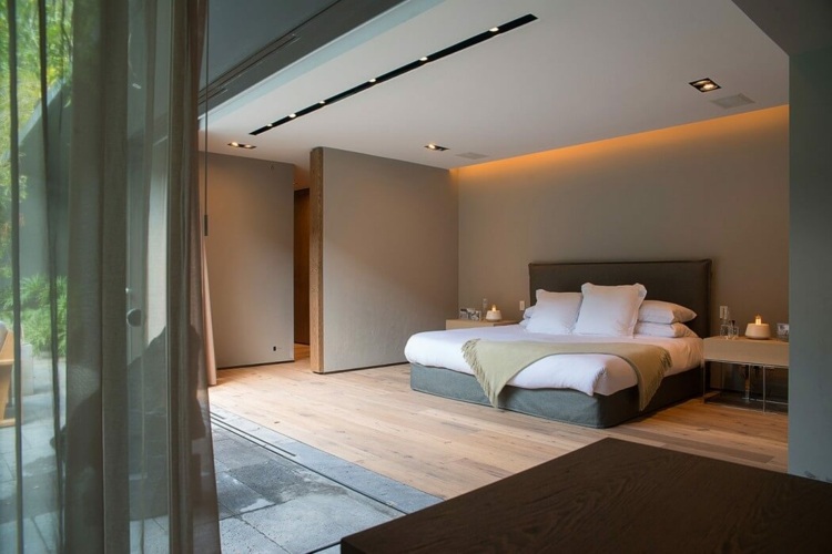 schlafzimmer design monochrome einrichtung in grau bett